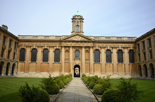 A beautiful shot of The Queen's College in Oxford, United Kingdom with a clear blue sky in the background