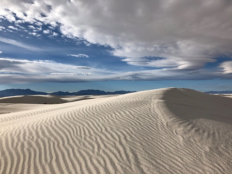 A beautiful view of the desert covered with wind-swept sand in New Mexico - perfect for background