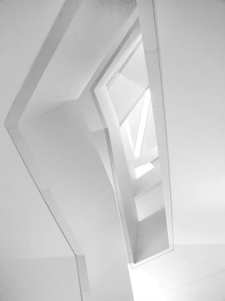 istock Low angle shot of beautiful white interior modern architecture - perfect for a background 1439415158