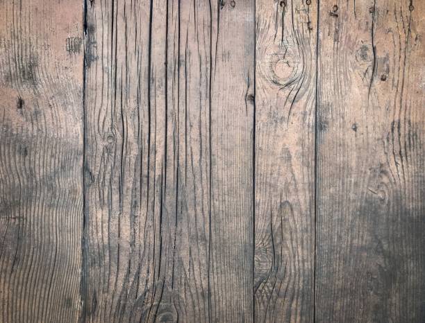 istock Background of a weathered wooden surface with a copy space 1439415270