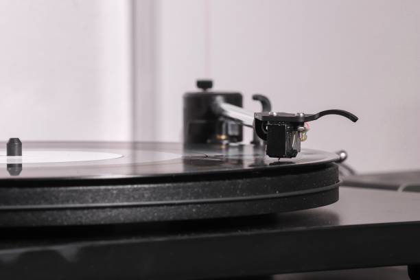 istock Vinyl record playing on a turntable. 1439415379