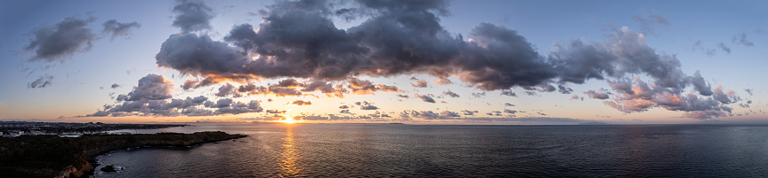 Panoramic view of sea sky and clouds at sunrise
