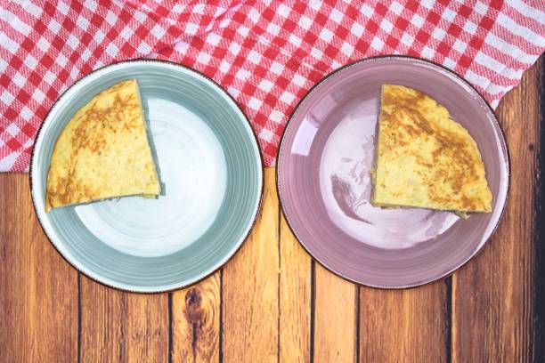istock Tasty cake with an egg yolk on a wooden table 1439416842