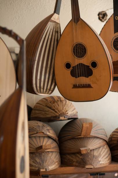istock Vertical shot of oud musical instruments hanging on the wall 1439417433