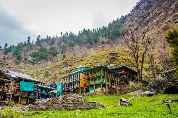 The colorful old buildings of ancient Indian village Malana in the state of Himachal Pradesh