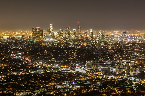 A beautiful shot of buildings at night time in Los Angeles