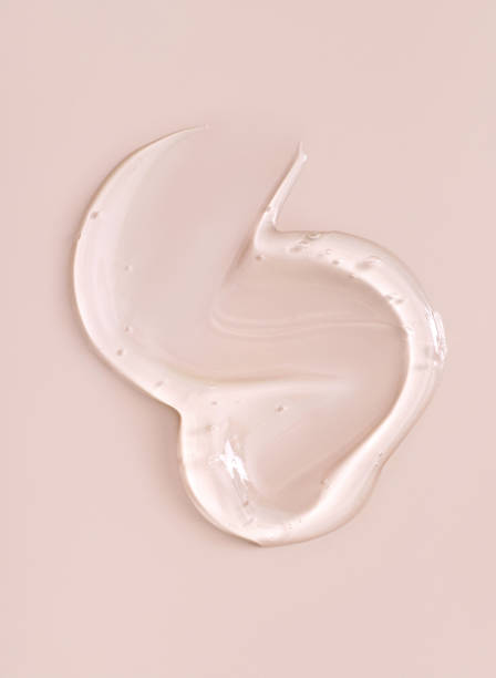 istock texture gel serum on begie background 1439423265
