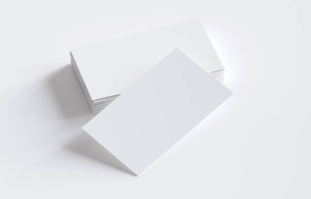 Stack of blank business cards on white background stock photo