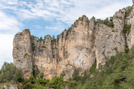 Big cliff seen from hiking trail on the corniches of Causse Mejean above the Tarn Gorges. La bourgarie, Lozere, France.