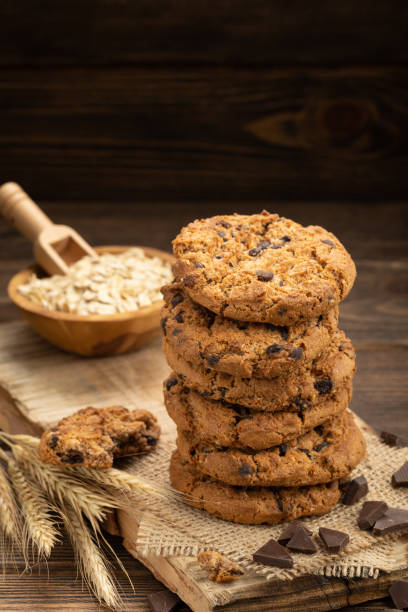 istock Oatmeal cookies on a wooden table. 1439429431