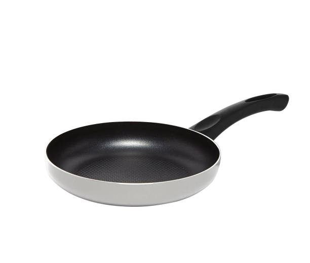 istock black frying pan isolated on white 1439436642