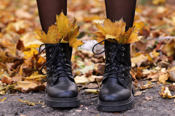 istock women's leather shoes with autumn leaves 1439439975
