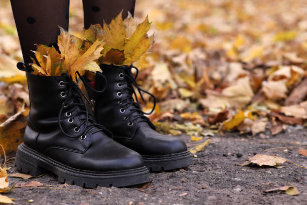istock women's leather shoes with autumn leaves 1439440018