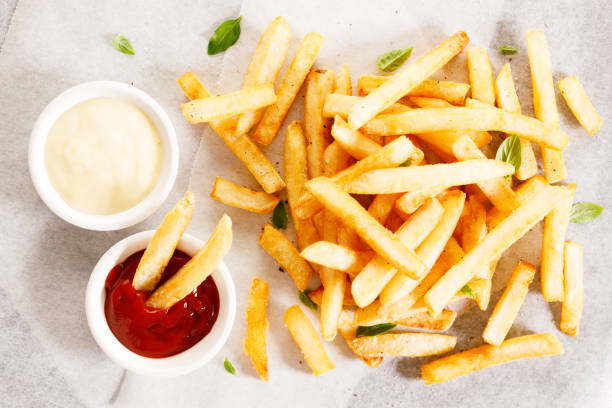 istock Potato fries with mayo and ketchup. 1439440364