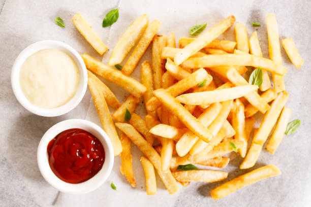 istock Potato fries with mayo and ketchup. 1439440367