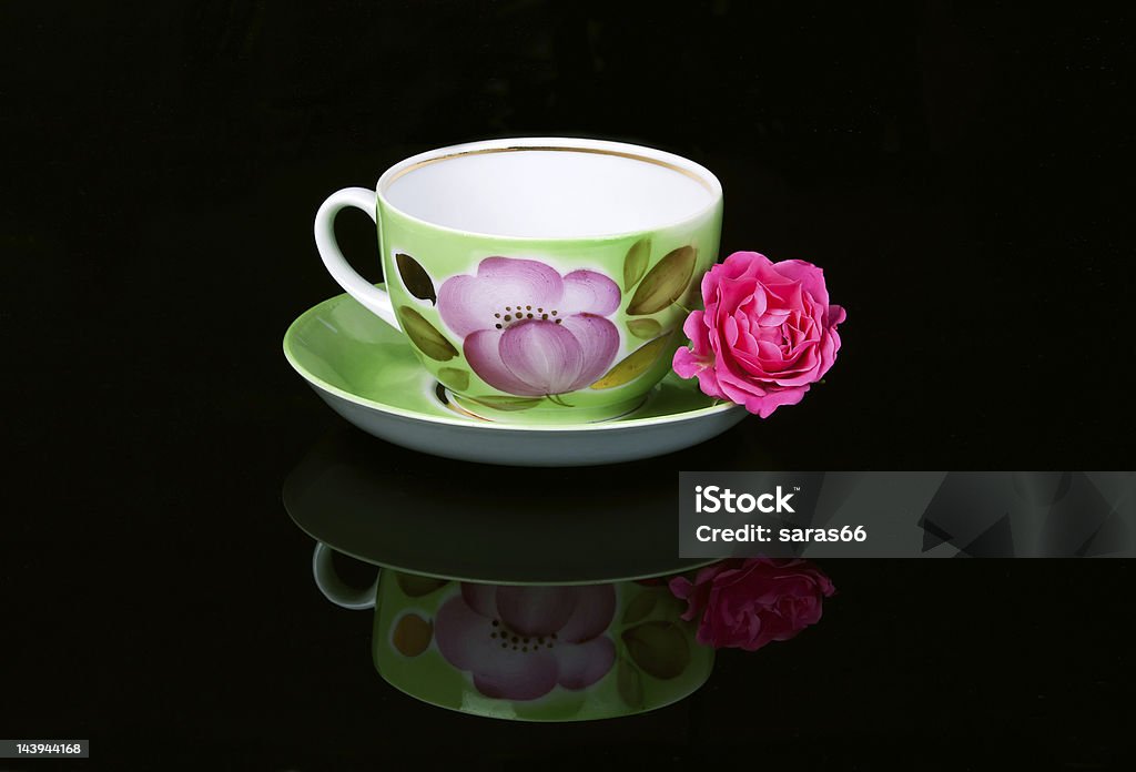 Cup of tea Cup for tea on a black background. Black Color Stock Photo