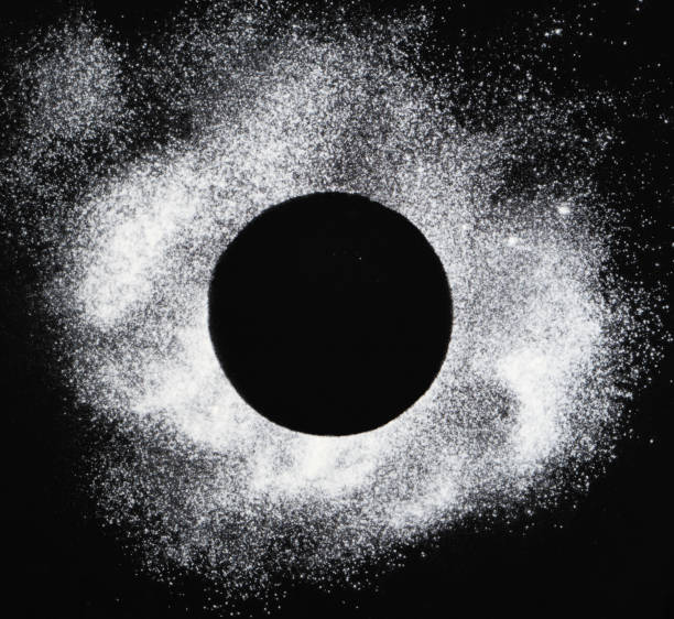 istock A circle of flour on a black background with space for text. 1439445070
