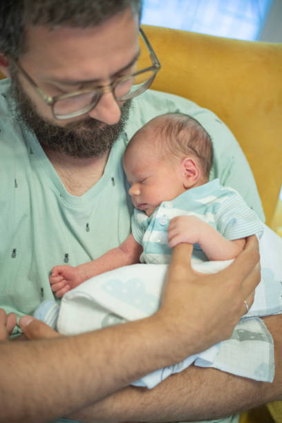 istock Dad enjoying with his newborn boy 1439450433