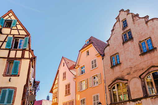 Alsace. Old ancient French city Colmar. Summer trip to France. European country. French architecture. Street. Facade of houses