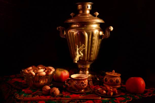 istock Closeup shot of a samovar in a beautiful interior setting on a black background 1439454735