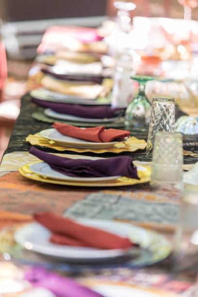 istock Vertical closeup shot of the reception table set for the wedding celebration 1439456909