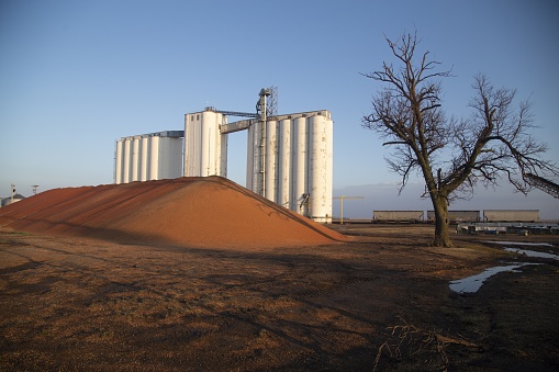 The grain elevators in the farmland in Colorado, Kansas, Oklahoma, Missouri