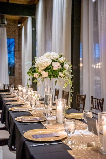 istock Vertical high angle shot of a wedding table with an elegant setting 1439458318