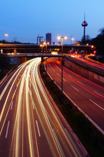 istock Vertical high angle shot of an illuminated highway at night 1439459724