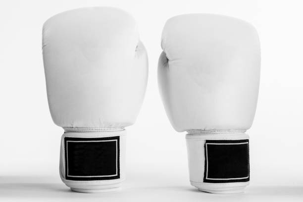istock White boxing gloves isolated on the white background 1439461352