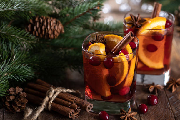 istock Mulled wine with orange slices, cranberries and spices 1439466599