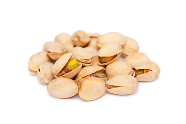 istock Pistachios isolated on white background 1439468817