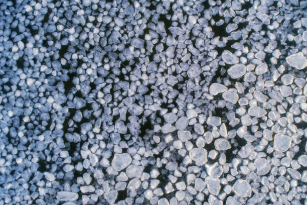 istock Frozen ice on as a background, a bird's-eye view. Textured surface 1439468894
