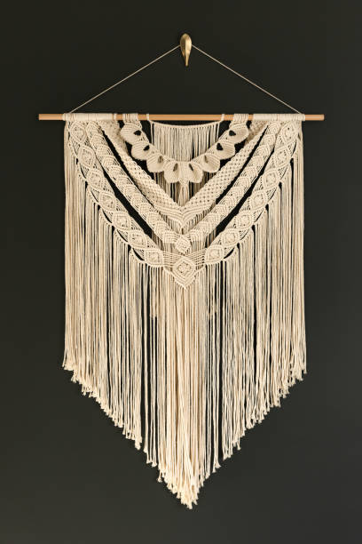istock DIY boho style macrame wall hanging tapestry on dark grey background 1439470142
