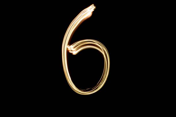 istock Light painting number 6 on black background 1439471798