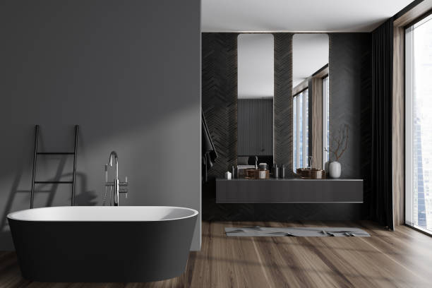 istock Grey bathroom interior with bathtub and double sink, window. Mockup empty wall 1439472491