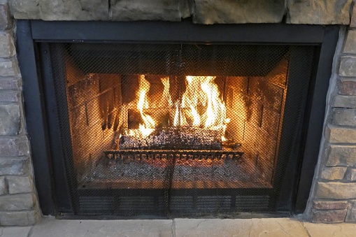 Beautiful view of burning wood in fireplace. Beautiful backgrounds.