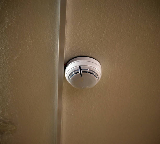 istock A fire sensor on the ceiling. Fire protection system in the form of a white box. 1439475029
