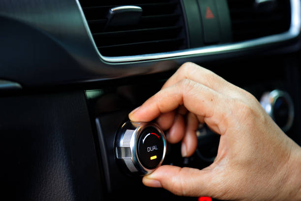 istock turn on the air conditioner in a modern car 1439475508
