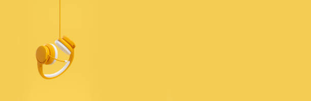 Headphones hanging on a wire, long banner copy space