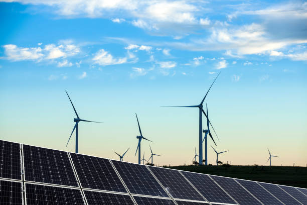 istock Solar photovoltaic panels and wind turbines 1439481404