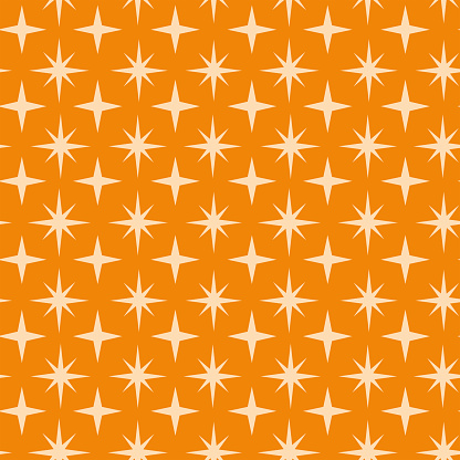 Mid century modern atomic starbursts seamless pattern on orange background. For home décor, textile and wallpaper