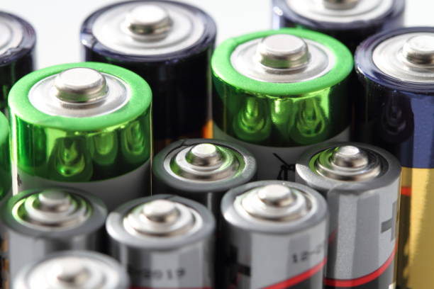 different batteries many round batteries battery stock pictures, royalty-free photos & images