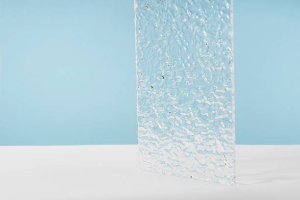 istock Acrylic ribbed plate, background for cosmetic product packaging on blue backdrop. Showcase for jewellery presentation, display for perfume advertising, cosmetics stand minimal  branding scene mockup 1439494879