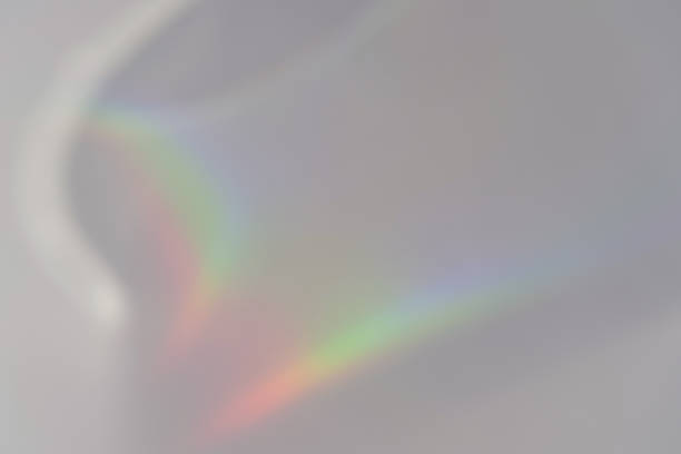 istock Abstract natural light refraction silhouette on water surface mock up
Caustic effect light refraction on white wall overlay photo mockup, blurred sun rays refracting through glass prism with shadow 1439494888