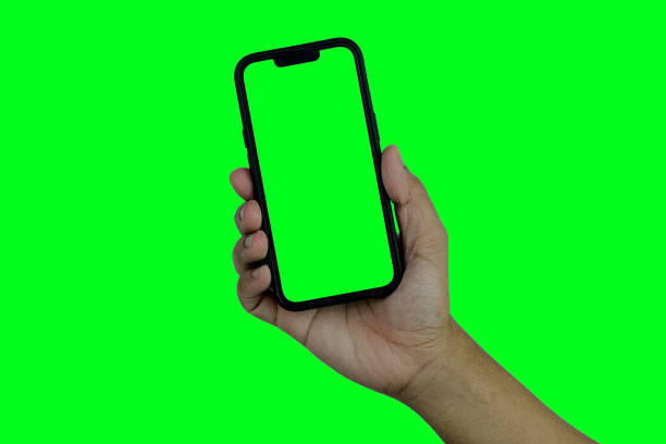 istock Hand holding mobile phone 1439495591