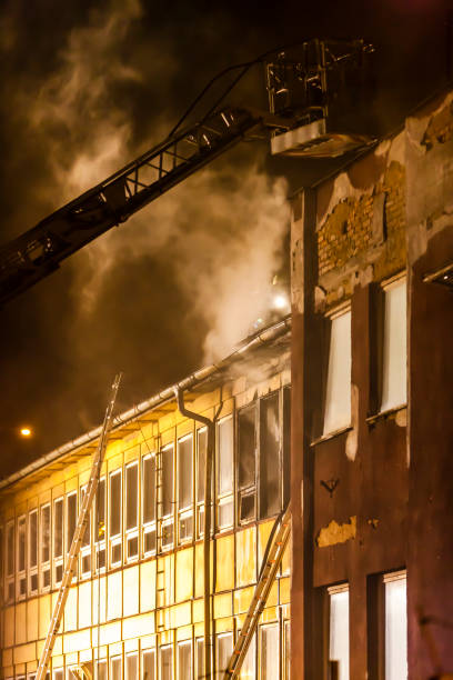 istock a building after the fire at night 1439497855