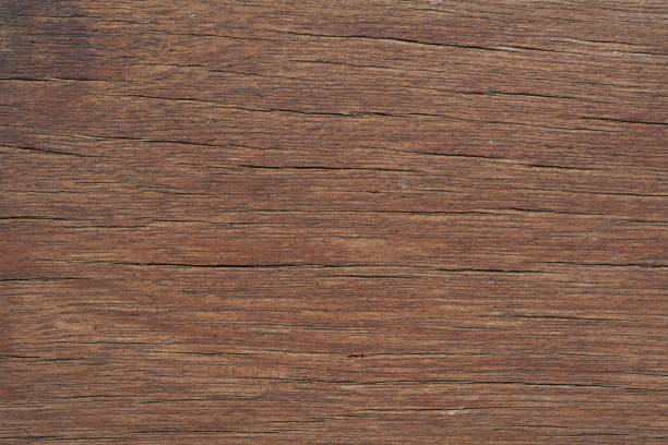 Close-up macro soft light on red brown wood surface board texture background.concept idea for natural material construction,backdrop,vintage or retro design.