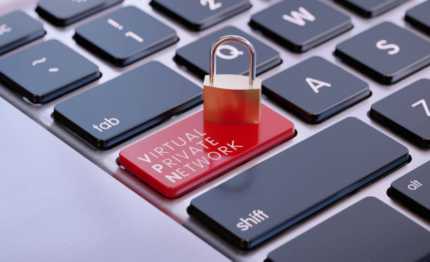istock Gold Colored Padlock Sitting On VPN Written Computer Keyboard 1439500996