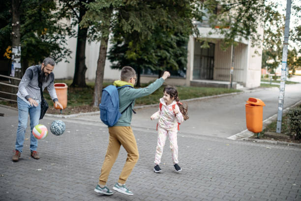 istock Kids happy and playing after school 1439501077