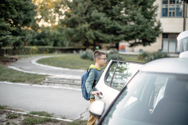 istock Kids entering car after school 1439501842